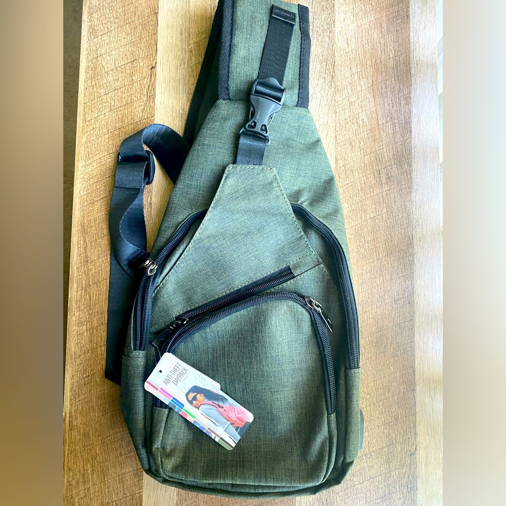 Large, crossbody day bag with with usb charging port to connect phone